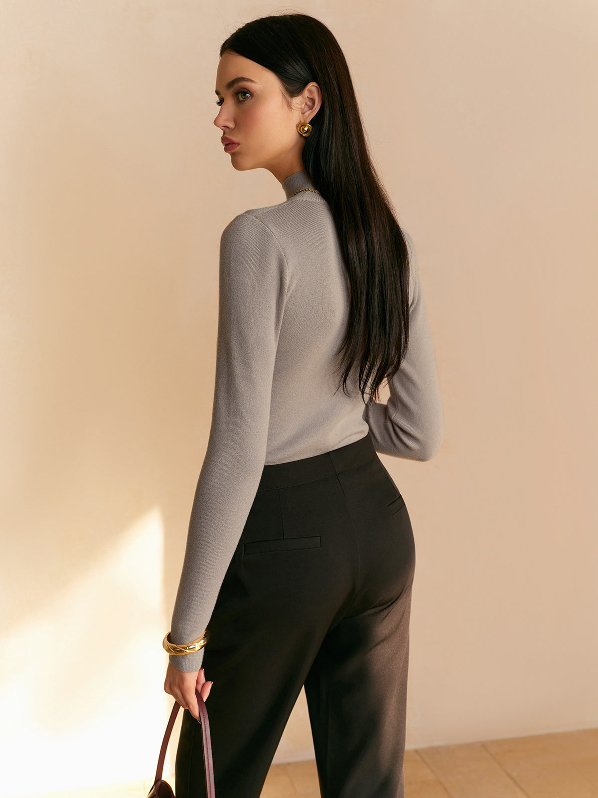 Women's rib knit sweater with mock neck and long sleeves