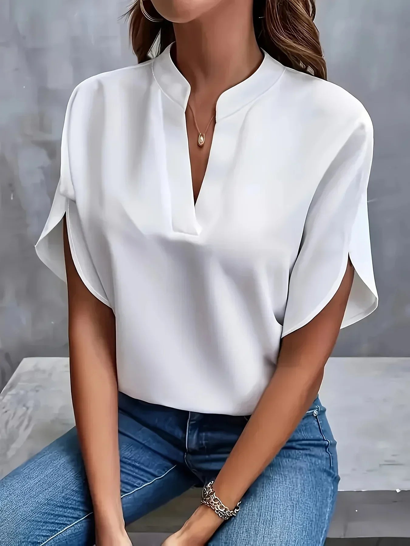 Women's Woven Blouse with Split Neck and Slit Flutter Sleeves